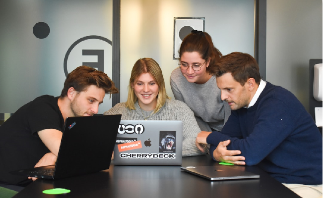 A business team reviewing RFP documents and evaluating proposals for efficient procurement management.