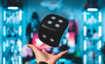 Illustration showing responsible gaming in sports betting with mobile and warning signs.