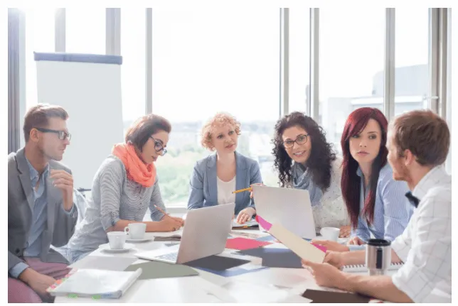 Developers following Git best practices on a laptop screen